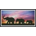 Silhouettes of Elephants against Sunset